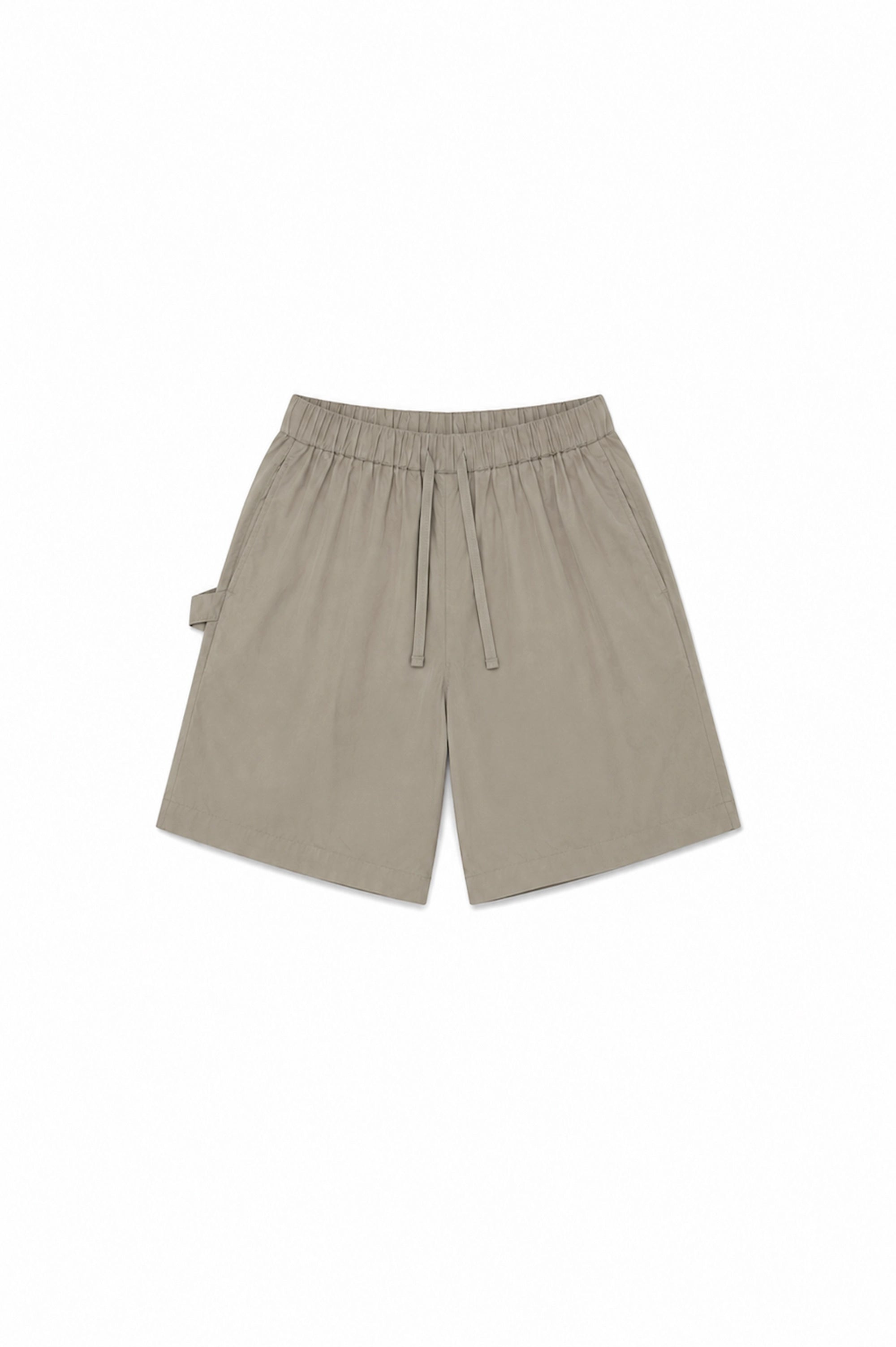 short en coton premium beige avec cordon assorti poches latérales homme meus paris vue de face 